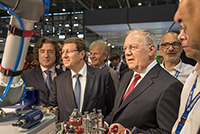 Mr. Robert Hensler with Mr. Johann Schneider-Ammann, Federal Councillor, and M. Mauro Poggia, State Councillor, EPHJ-EPMT-SMT exhibition, June 2017.